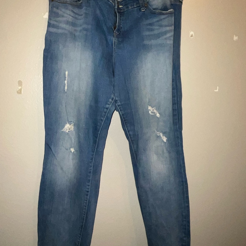 Distressed Blue Denim Jeans